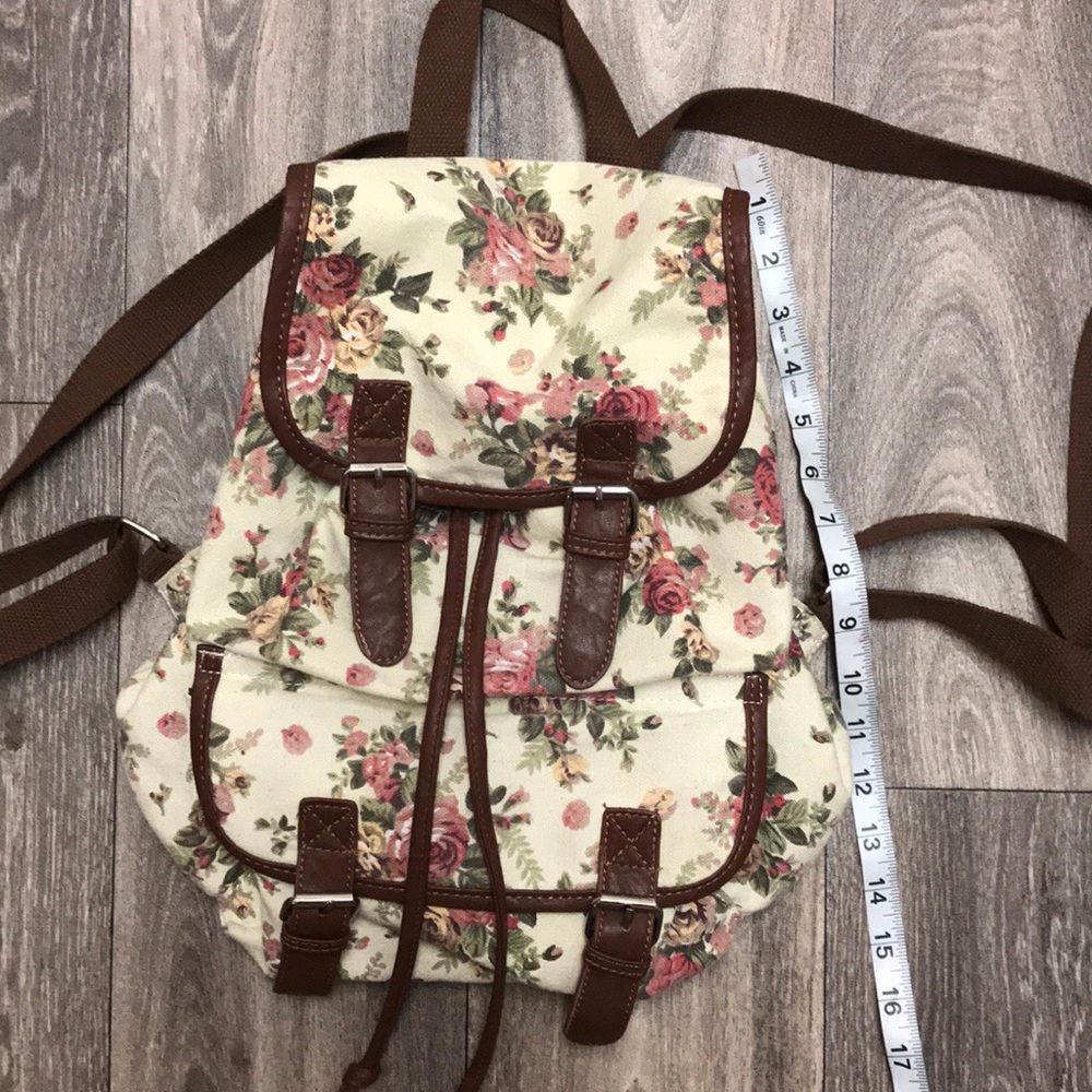 Flower buckled backpack